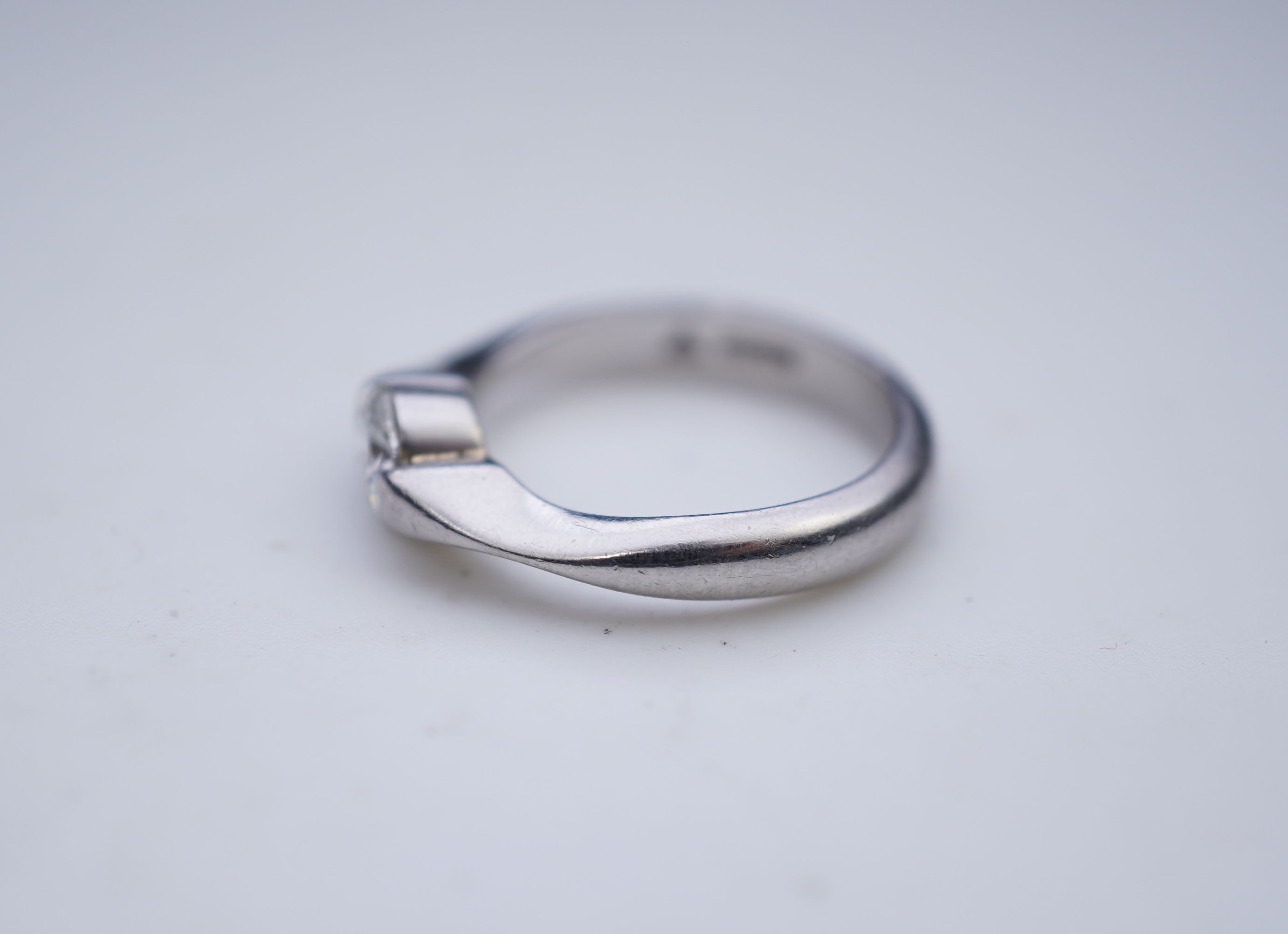 A diamond solitaire ring